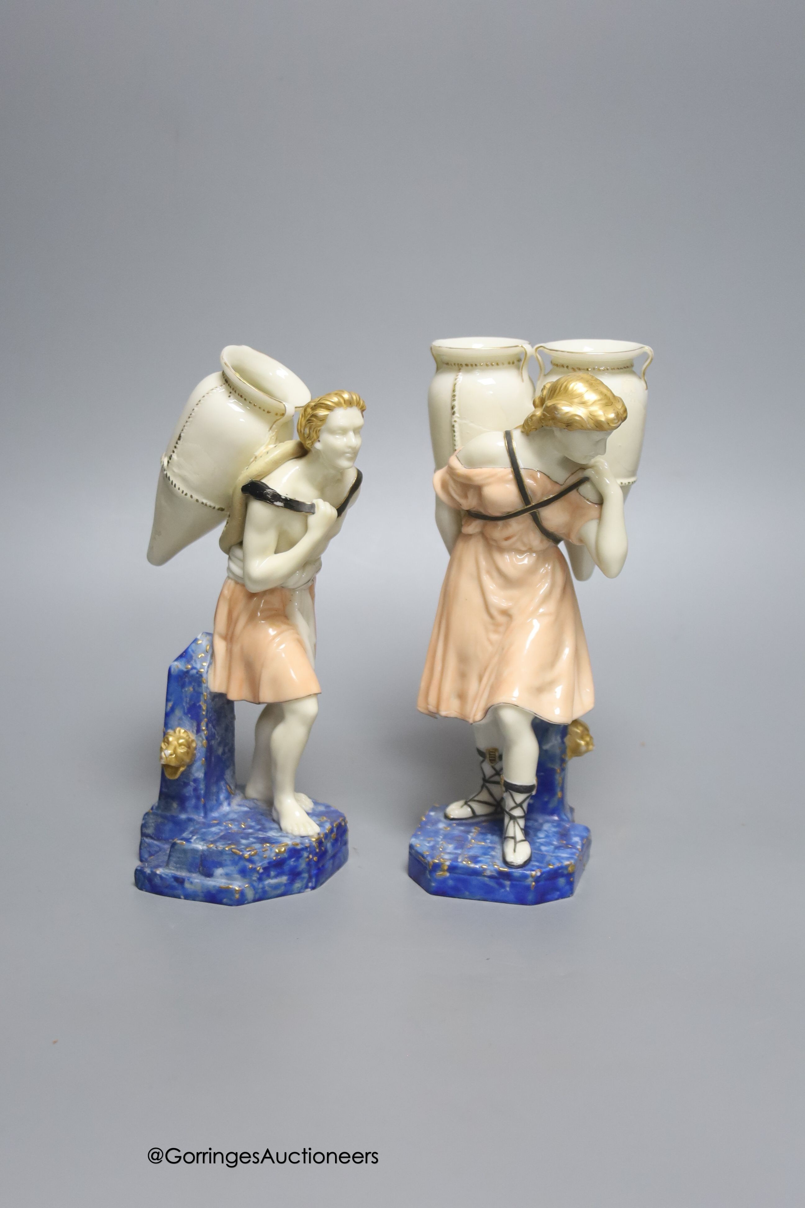 A pair of Worcester water carriers, 19.5cm